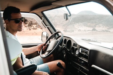 Man driving a car