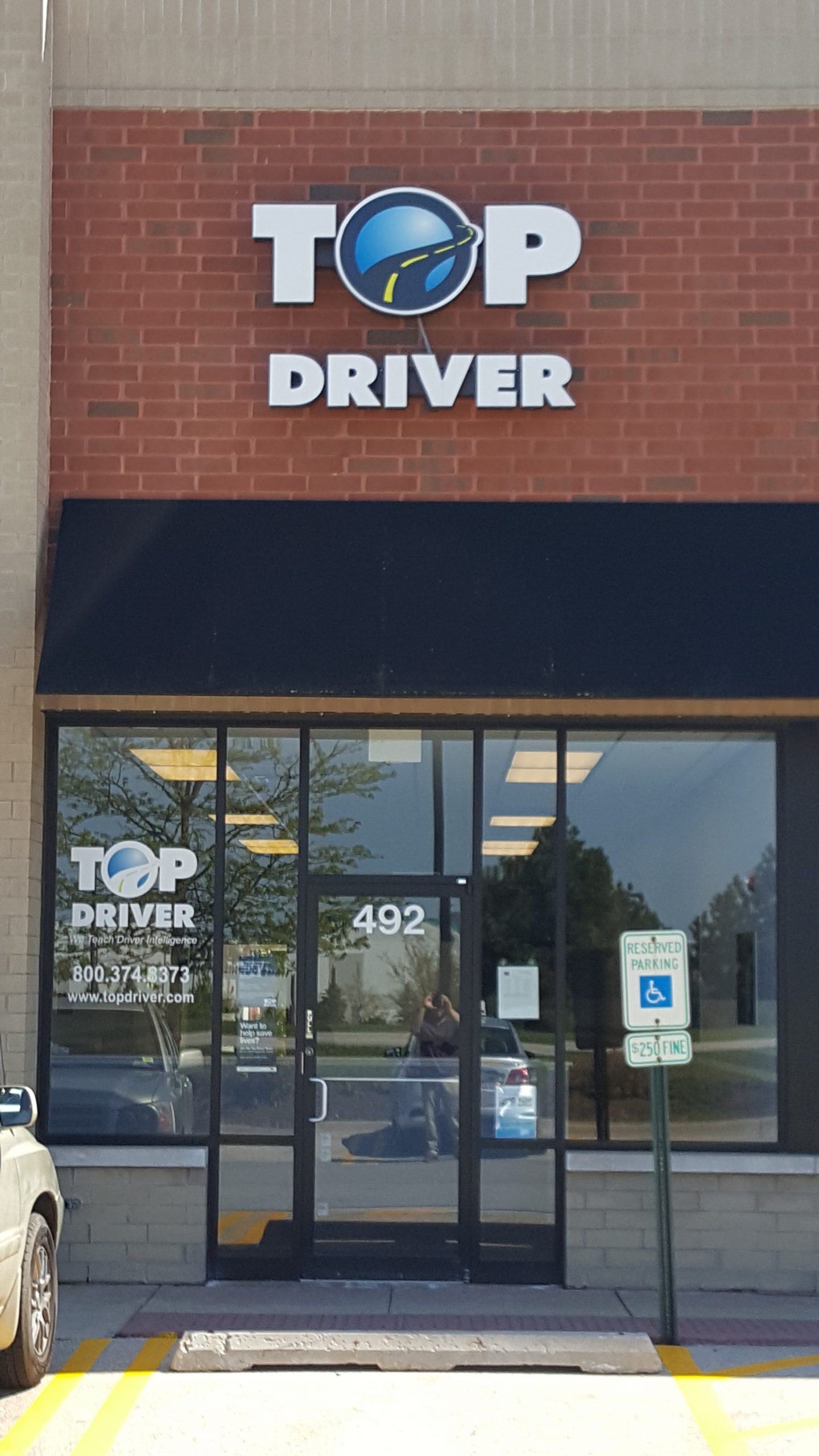 top driver exterior storefront