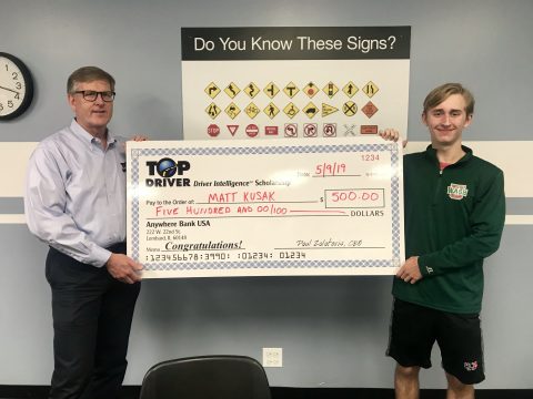 Matt Kusak $500 check from Top Driver
