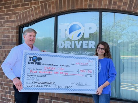 Sarah Lau $500 check from Top Driver